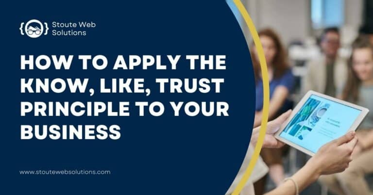 A businessman holds a tablet while presenting the business to the clients.