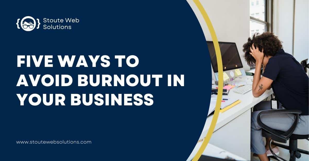 A lady sitting in front of a computer gets burnout doing business.