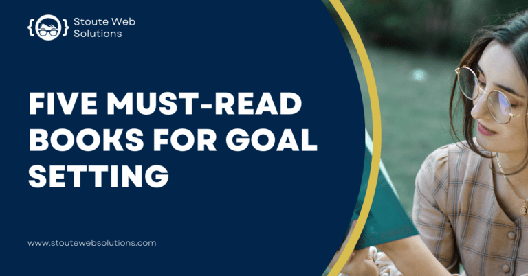 A young lady wearing glasses is reading a book.