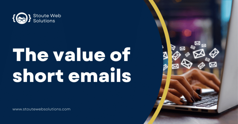 A lady's hands are surrounded by tiny white envelopes while typing short emails.