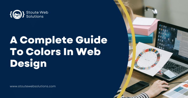 “A Complete Guide to Colors in Web Design” beside a designer’s workspace with a laptop, color wheel, and notepads.